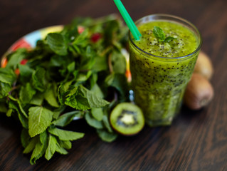 Fresh green smoothie with kiwi and mint . Love for a healthy raw food concept. Healthy eating. Fruit Smoothies. Kiwi.