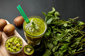 Fresh green smoothie with kiwi and mint . Love for a healthy raw food concept. Healthy eating. Fruit Smoothies. Kiwi.