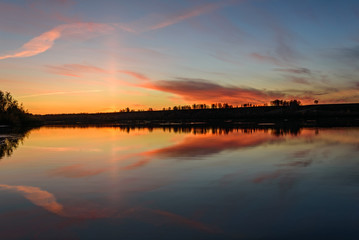 Obraz premium lake sunrise sky clouds reflection