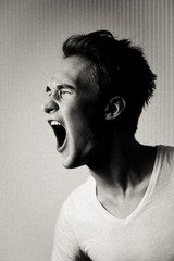 Black and white picture of screaming man