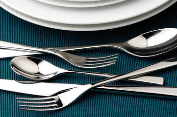 Silverware and plates on a holiday table