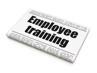 Education concept: newspaper headline Employee Training