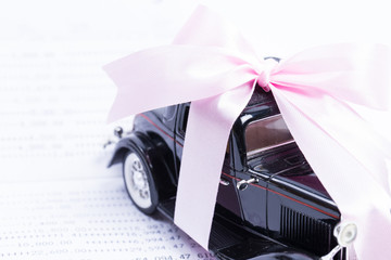 Loan Finance Concepts, toy car with passbook as background