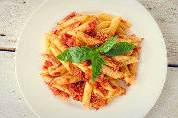 Penne pasta with tuna and basil