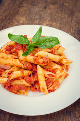 Penne pasta with tuna and basil