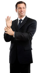 Businessman satisfied wiping hands on white