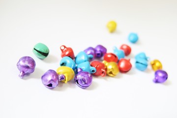 Fototapeta premium Small colorful bells isolated and Christmas decoration. Christmas ornament