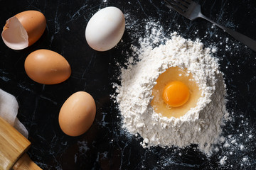 Baking background with egg and flour