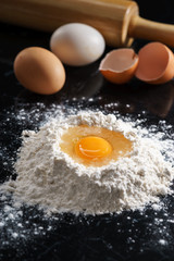 Baking background with egg and flour
