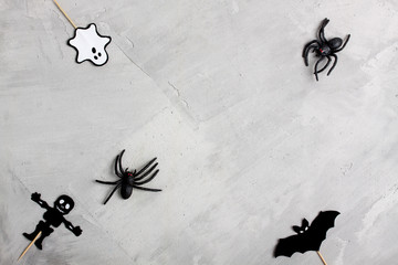 Halloween paper ghost, bat, skeleton and rubber spiders
