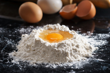 Baking background with egg and flour