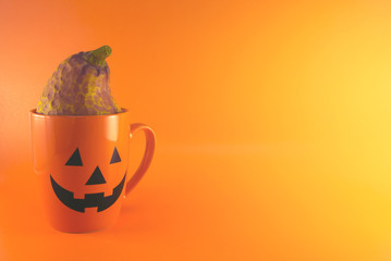 cup and pumpkin orange