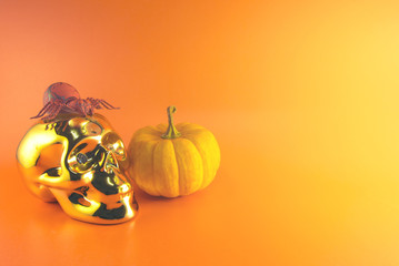 gold skull pumpkin and spider