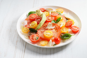Tomato, avocado and red onion salad