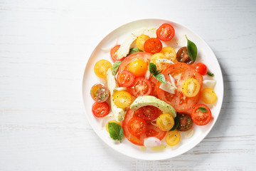 Tomato, avocado and red onion salad