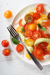 Tomato, avocado and red onion salad