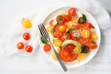 Tomato, avocado and red onion salad