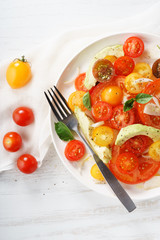 Tomato, avocado and red onion salad