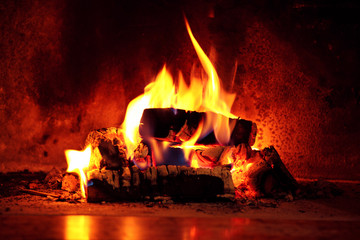 Flame in fireplace.