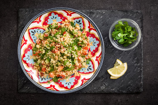 Couscous Tabbouleh on a Dark Stone Table