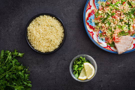 Couscous Tabbouleh on a Dark Stone Table
