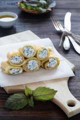 Vegetable rolls with cream cheese and basil