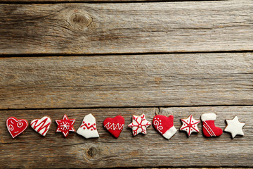 Gingerbread cookies on a grey wooden table