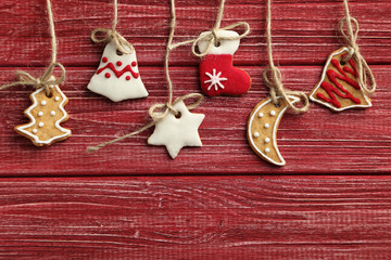 Christmas cookies on a red wooden table