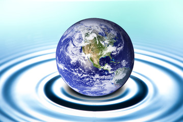 Earth drop on water,Elements of this image furnished by NASA