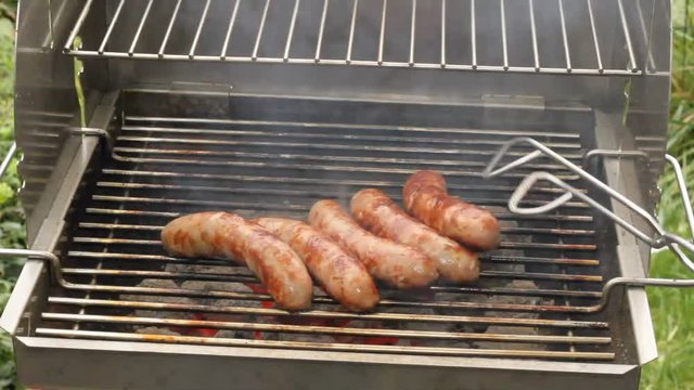 Grilled sausages on a grill