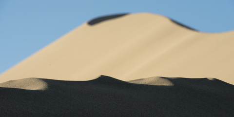 Fototapeta na wymiar Singing sand dunes at Mingsha Shan, Gobi Desert, Dunhuang, Jiuqu