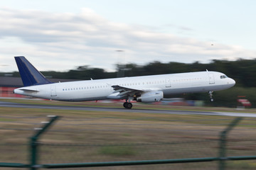 Fototapeta na wymiar starting airplane speed blur