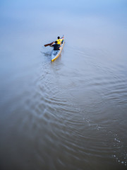 The boy in the kayak,river