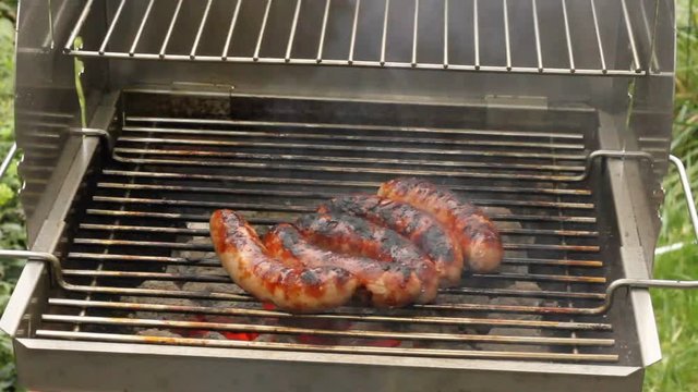 Grilled sausages on a grill