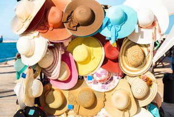 Colorful female summer hats for sale.
