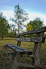 Fototapeta premium An old wooden bench at the park