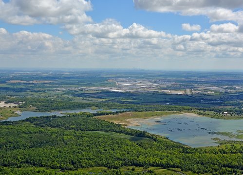 aerial view of the Kelso Conservation Area with the Milton industrial area in the background, Ontario Canada 