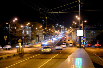 Fototapeta na wymiar Evening car traffic on a Moscow street.