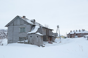 Old wooden houses in the village of Teriberka, Murmansk oblast, Kola Peninsula, Russia