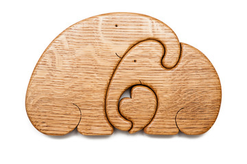 Wooden puzzle in the form of elephant family isolated on white © Andrii Kozachenko