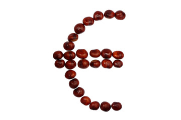 Euro symbol is lined by chestnuts on a white background, isolated