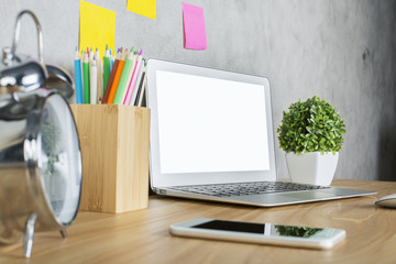 Desktop with white laptop