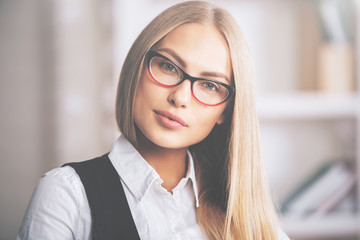 Focused female in glasses