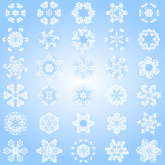 Large collection of delicate intricate snowflakes