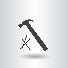 icon silhouette isolated hammer with nails black icon vector illustration