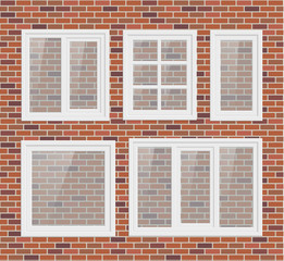 Set of transparent metal plastic windows on brick wall
