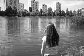 cute girl near water