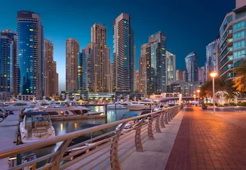 Fotobehang Dubai Marina Towers Uitzicht bij zonsondergang in het magische Blue Hour © MohammedTareq