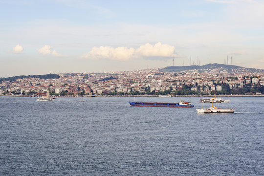 barge floating along the shores of the Bosphorus in Istanbul