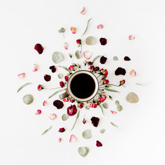 black coffee mug and red rose buds bouquet with eucalyptus on white background. flat lay, top view
